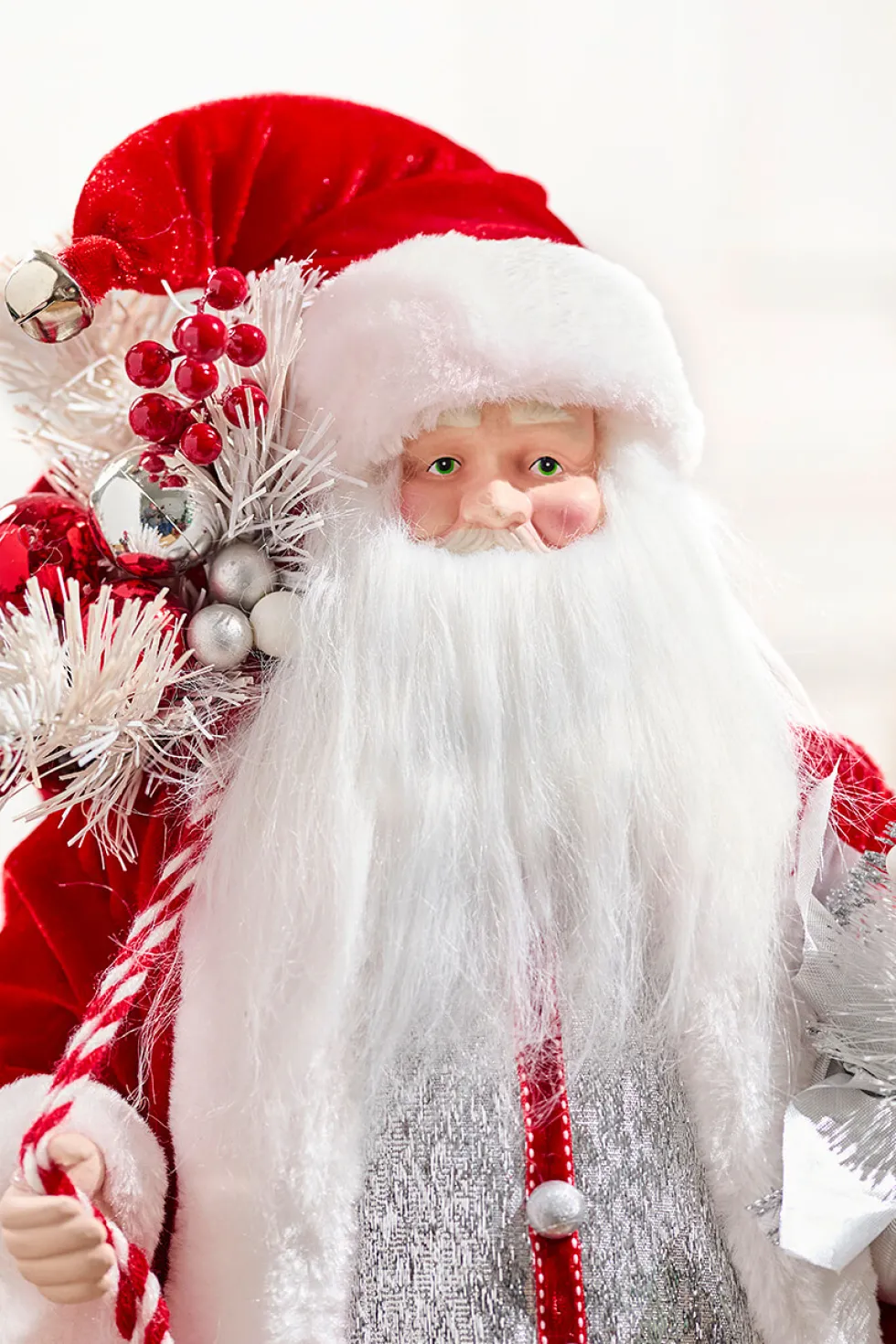 20" Santa Figure Holding Silver Tree
